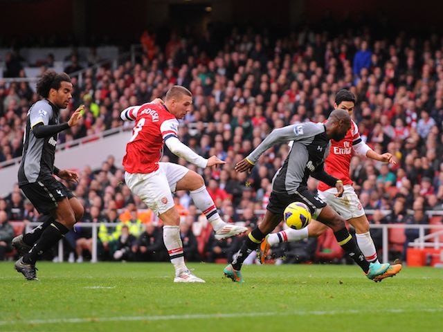 Lukas Podolski scores Arsenal's second on November 17, 2012