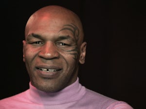 Tyson reunites with Holyfield