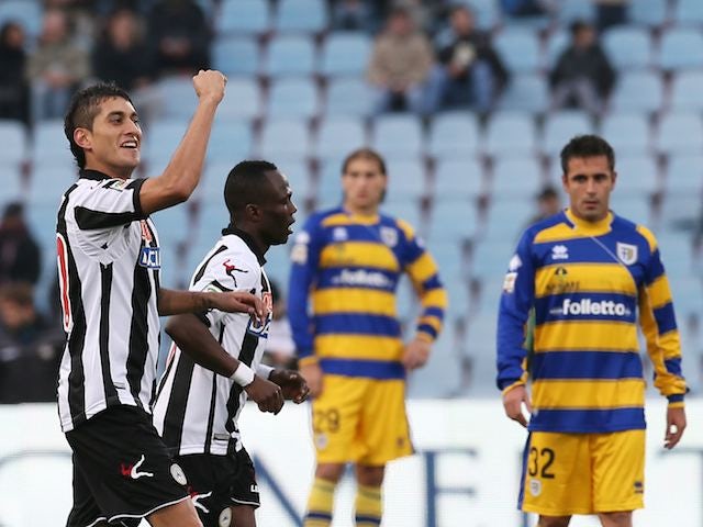 Roberto Pereyra raises his fist after scoring for Udinese on November 18, 2012