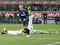 Inter's Rodrigo Palacio cheers after Cagliari's Davide Astori scores an own goal on November 18, 2012