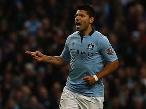 Aguero not giving up on Champions League