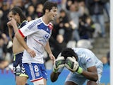 Yoann Gourcuff celebrates after Lyon go 1-0 up over Reims on November 18, 2012