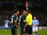 Alvaro Arbeloa is shown a red card on November 21, 2012