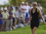 Rory McIlroy's girlfriend Caroline Wozniacki struts around the course on November 24, 2012
