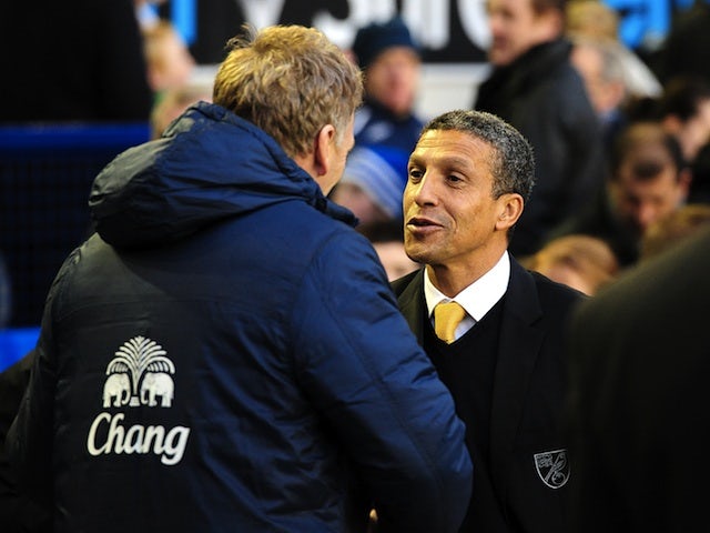 Everton's David Moyes greets Norwich boss Chris Hughton on November 24, 2012