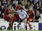 Valencia's Ever Banega challenges three Bayern players on November 20, 2012