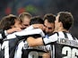 Fabio Quagliarella is mobbed by team-mates after scoring versus Chelsea on November 20, 2012