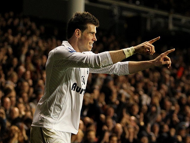 Gareth Bale celebrates moments after scoring his team's second goal on November 25, 2012