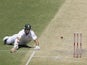 South Africa's Graeme Smith dives to avoid being run out on November 23, 2012
