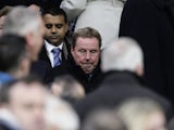 New QPR boss Harry Redknapp sits amongst the crowd at Old Trafford on November 24, 2012