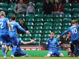 Inverness Caledonian Thistle's William McKay celebrates his goal with teammates on November 24, 2012