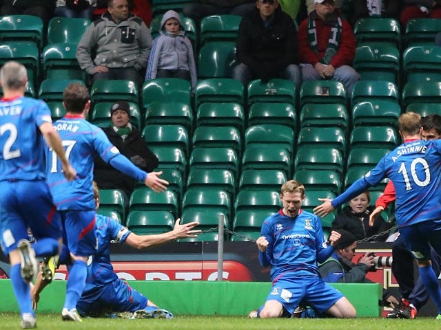 Inverness Caledonian Thistle's William McKay celebrates his goal with teammates on November 24, 2012