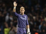 A frustrated Joe Hart waves to fans after the final whistle on November 21, 2012