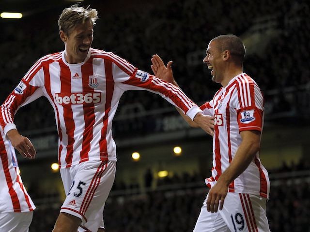 Jonathan Walters celebrates with Peter Crouch after scoring for Stoke on November 19, 2012