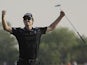 Justin Rose celebrates at the 18th after an excellent final round at the World Tour Championship in Dubai on November 25, 2012