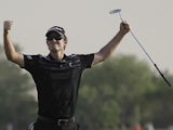 Justin Rose celebrates at the 18th after an excellent final round at the World Tour Championship in Dubai on November 25, 2012
