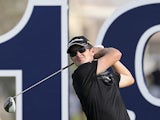 Justin Rose tees off at the 18th during the World Tour Championship in Dubai on November 25, 2012