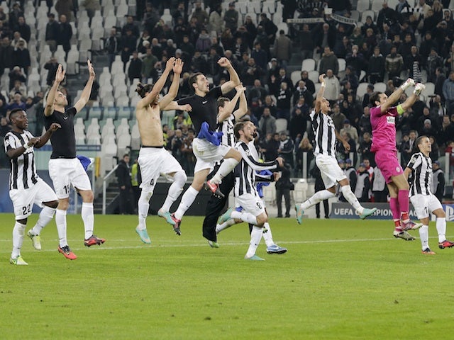 Juventus players celebrate their win over Chelsea on November 20, 2012