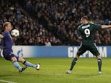 Karim Benzema scores the opener for Real Madrid past Joe Hart on November 21, 2012
