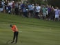 Co-leader after three rounds Luke Donald plays a shot on Hole 18 of the DP World Golf Championship on November 24, 2012