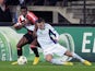 Anderlecht's Massimo Bruno and AC Milan's Kevin Constant clash on November 21, 2012