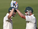 Australia's Michael Hussey and Michael Clarke celebrate against South Africa on November 22, 2012