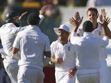 South Africa's Morne Morkel celebrates with team-mates on November 24, 2012