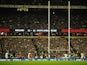 England's Owen Farrell kicks a penalty during the final stages of the match against South Africa on November 24, 2012