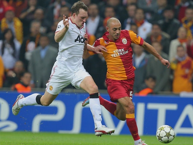 Man Utd's Phil Jones battles Nordin Amrabat of Galatasaray on November 20, 2012
