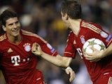 Thomas Muller and Mario Gomez celebrate Bayern's equaliser on November 20, 2012
