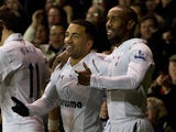 Jermain Defoe congratulates Aaron Lennon moments after scoring Tottenham's first goal against Liverpool on November 28, 2012