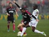 Marseille's Morgan Amalfitano and Brest's Abdoulwahid Sissoko battle for the ball on December 2, 2012