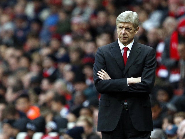 Arsenal manager Arsene Wenger on the touchline in the match against Swansea City on December 1, 2012