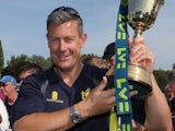 Ashley Giles standing proudly with his trophy on September 6, 2012