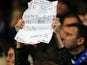 A young Chelsea fan holds up an anti-Rafa Benitez sign on November 28, 2012