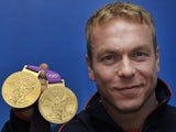 Chris Hoy with his two London 2012 gold medals on August 7, 2012
