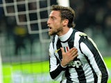 Juventus' Claudio Marchisio celebrates scoring his team's opening goal against Torino on December 1, 2012