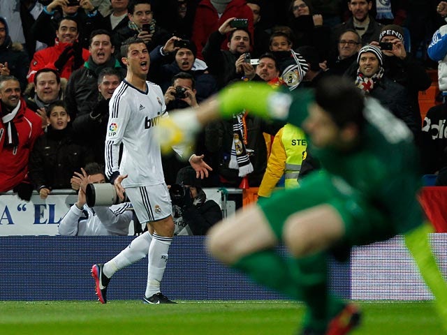 Real Madrid's Cristiano Ronaldo celebrates after scoring the opener for his team on December 1, 2012