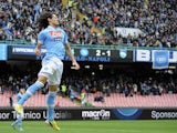 Napoli's Edinson Cavani celebrates after scoring against Pescara on December 2, 2012