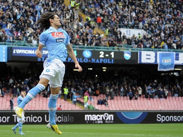 Napoli's Edinson Cavani celebrates after scoring against Pescara on December 2, 2012