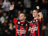 Nice's Eric Bautheac and Jeremy Pied celebrate their team's win over Paris Saint-Germain on December 1, 2012