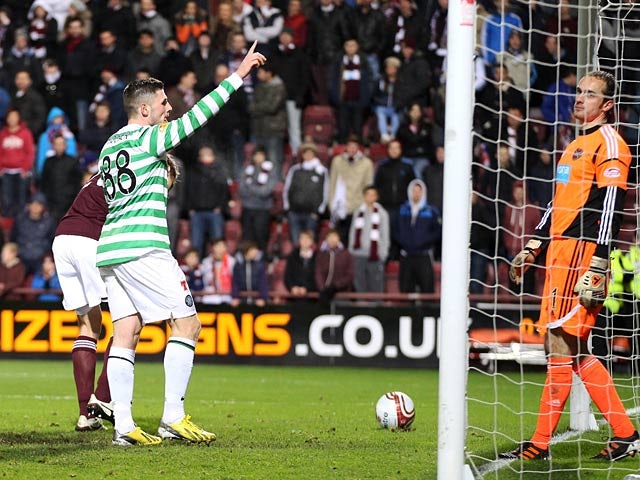 Gary Hooper celebrates moments after scoring the fourth goal for his team against Hearts on November 28, 2012