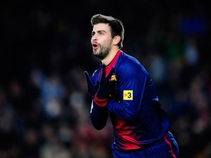 Pique's son gets first Barca kit