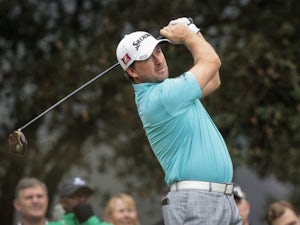 McDowell shares French Open lead