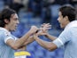 Lazio's Hernanes congraulates Giuseppe Biava after scoring the opener against Parma on December 2, 2012