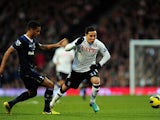 Kyle Naughton and Kerim Frei battle for the ball on December 1, 2012