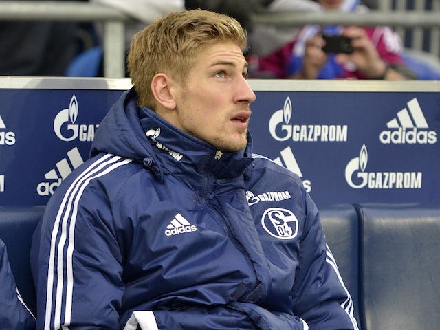 Schalke's Lars Unnerstall sits on the bench on December 1, 2012