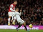 Leon Britton attempts to block Lukas Podolski's shot on goal on December 1, 2012