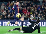 Barcelona's Lionel Messi scores the opener against Athletic Bilbao on December 1, 2012