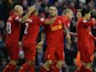 Danniel Agger is congratulated by team mates after scoring the opener on December 1, 2012